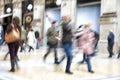 Urban move, people walking in city, motion blur, zoom effect Royalty Free Stock Photo
