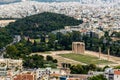 Urban nature: panoramic view of ruins of temple of olympian zeus, athens city and green nature Royalty Free Stock Photo