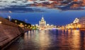 Urban night background, Moscow, the capital of Russia. Embankment in the city center, view of the river and the historic center o Royalty Free Stock Photo