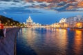 Urban night background, Moscow, the capital of Russia. Embankment in the city center, view of the river and the historic center o Royalty Free Stock Photo