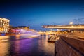 Urban night background, Moscow, the capital of Russia. Embankment in the city center, view of the river and park Zaryadye Royalty Free Stock Photo