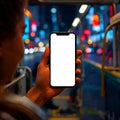 Urban night commute Person holds blank smartphone screen Royalty Free Stock Photo