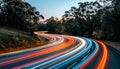 Urban night traffic fast moving cars creating light trails on illuminated highway Royalty Free Stock Photo