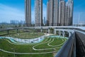 urban overpass bridge and modern buildings under blue sky Royalty Free Stock Photo