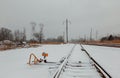 Urban railway system, tracks in snow, winter time Royalty Free Stock Photo