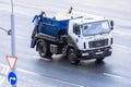 Urban recycling truck driving on the road