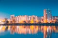 Urban Residential Area Overlooks To City Lake Or River And Park In Evening Illumination, Reflecting In Water Surface Royalty Free Stock Photo