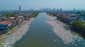 An Urban River Choked by Plastic Pollution Royalty Free Stock Photo
