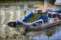 Urban River Cleanup Operation, Milwaukee - Worker on Debris Collection Boat Royalty Free Stock Photo