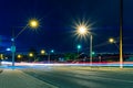 Urban road street lights with cars trails