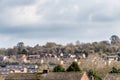 Urban scene across built up area showing the slate roof tops of terraced houses on an old housing estate in England Royalty Free Stock Photo