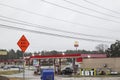 Urban scene with EBT sign gas price 2.19 and McDonalds