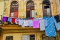Urban scene with old colonial building facade in Old Havana, Cub