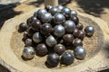 Urban sculpture of petanque balls, Gordes, France, close-up