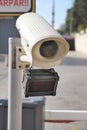 Urban security camera placements near vehicles captured in video footage