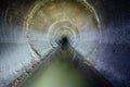 Urban sewage flowing throw round sewer tunnel pipe