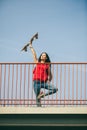 Urban skate girl with skateboard. Royalty Free Stock Photo