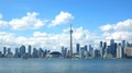 Urban skyline of Toronto city seen from across Lake Ontario, Ontario, Canada.