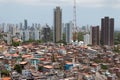 Urban social contrast. Buildings and slum. Inequality