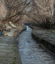 Urban stream in winter. The Lybid river Royalty Free Stock Photo