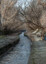 Urban stream in winter. The Lybid river Royalty Free Stock Photo