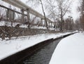 Urban stream in winter. The Lybid river Royalty Free Stock Photo