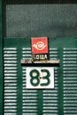 Popovo, Bulgaria - Old houseÃ¢â¬â¢s metal aged door with mailbox and sign 83 number, urban concept, green door