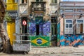 Urban street art on buildings in derelict road in backstreets of Lapa neighbourhood in Rio de janeiro, Brazil, South America