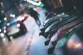 Garbage cans and street lights in urban city, evening Royalty Free Stock Photo