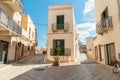 Urban street with typical mediterranean houses on the island Favignana in Sicily, Trapani, Italy