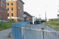 Neighborhood streets with metal fence