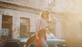 Urban stylish girl with skateboard