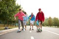 Urban teen boys on skateboards