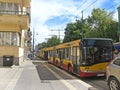 Urban transport. Buses at stop. Transporting passengers in city