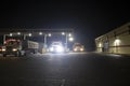 Urban truck stop and convenience store at night Royalty Free Stock Photo