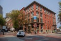 Urban view of Downtown Vancouver. Old and modern buildings, roads, commercial establishments on sunny summer day Royalty Free Stock Photo