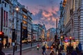 Urban view of London city near Piccadilly Circus with night traffic. Rush hour in London city against a cloudy sky at night Royalty Free Stock Photo