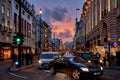 Urban view of London city near Piccadilly Circus with night traffic. Rush hour in London city against a cloudy sky at night Royalty Free Stock Photo