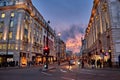 Urban view of London city near Piccadilly Circus with night traffic. Rush hour in London city against a cloudy sky at night Royalty Free Stock Photo