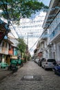 Urban view of street in the historical Intramuros district in Manila