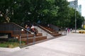 Urban walkway of the Goods Line with people on theater seating on campus of University Technology Sydney UTS, Australia.