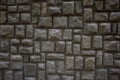 Urban wall grey decorative stone blocks texture outside a building. Royalty Free Stock Photo