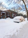 Urban winter street with lots of snow