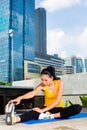 Urban woman sports - fitness in Asian city Royalty Free Stock Photo