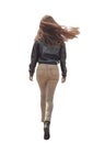 Urban Woman Walking Away in Stylish Jeans and Leather Jacket. long blond hair. PNG file