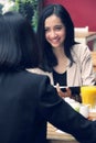 Urban women meeting in a restaurant