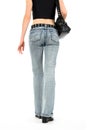 Urban young woman in jeans