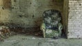 Urbex. Armchair in abandoned brickyard Royalty Free Stock Photo