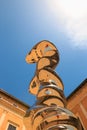 Urbino, Italy - August 9, 2017: The Castle of the Dukes of Urbino. Elliptical Column, the steel column made by British artist Ton