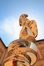 Urbino, Italy - August 9, 2017: The Castle of the Dukes of Urbino. Elliptical Column, the steel column made by British artist Ton